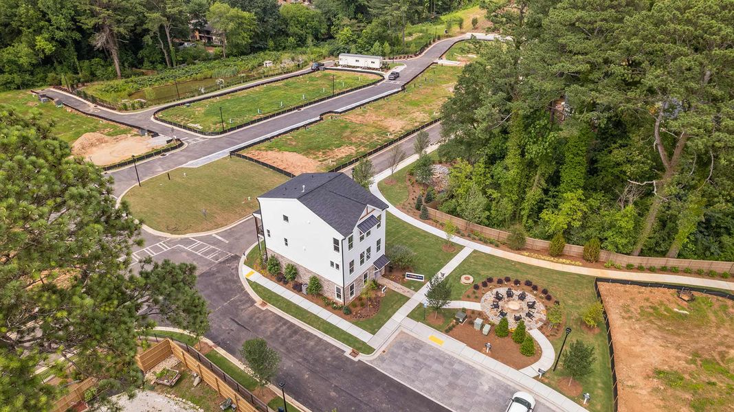 Aerial view of the Celesta community in Scottdale, GA, showing layout and nearby surroundings (Image 11). Aerial view of the Celesta community in Scottdale, GA, showing layout and nearby surroundings (Image 11).