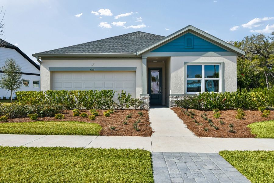 Front exterior of a home in the Oakfield at Mount Dora Cottage Series community, located in Mount Dora, FL (Image 3).
