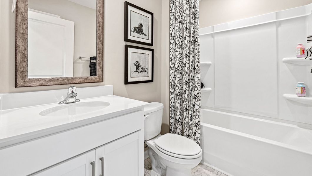 Furnished interior in a model home at Lightwood Cottages in Moore (Image 11).