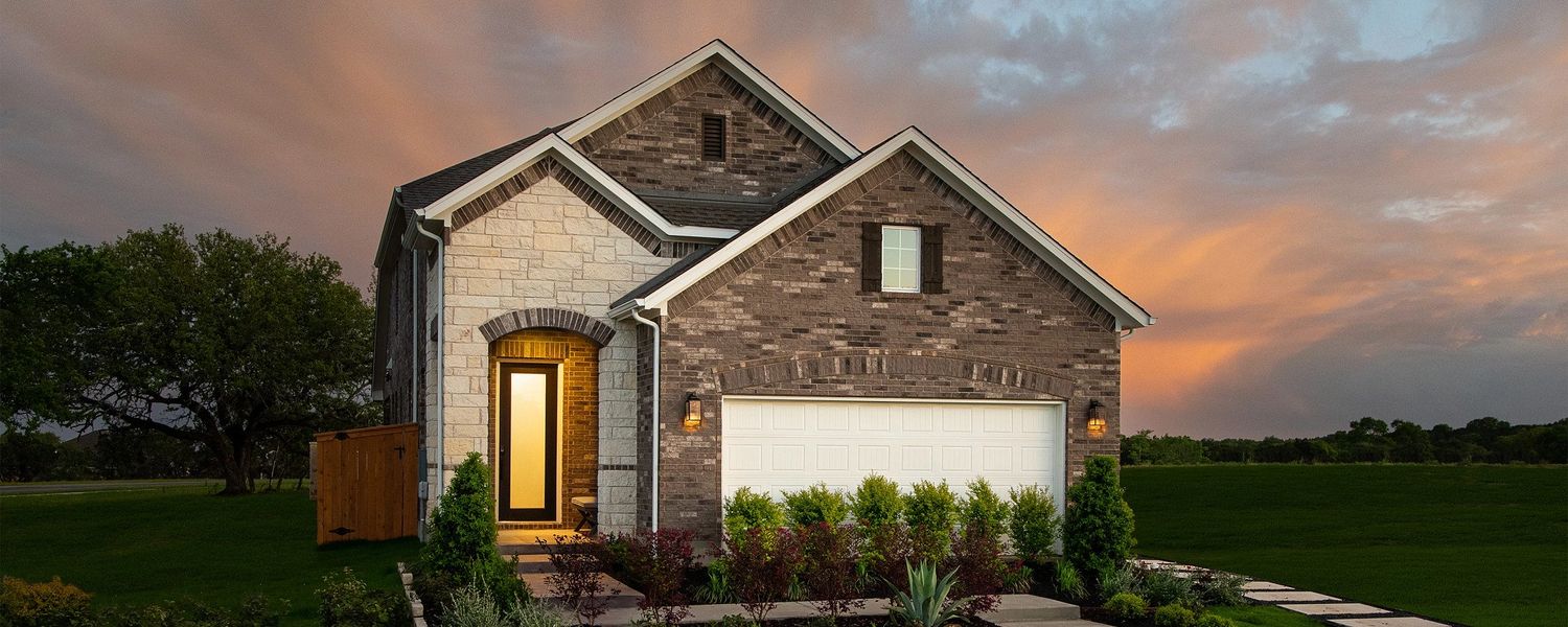 Front exterior of a home in the La Cima community, located in San Marcos, TX (Image 3). Front exterior of a home in the La Cima community, located in San Marcos, TX (Image 3).