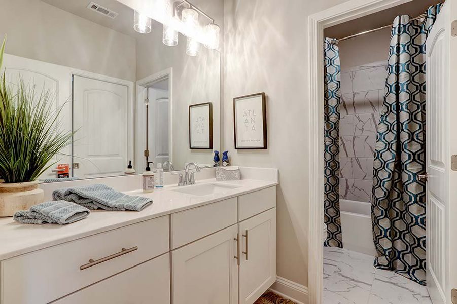 Furnished interior in a model home at Terraces at Paravel in Acworth (Image 8).