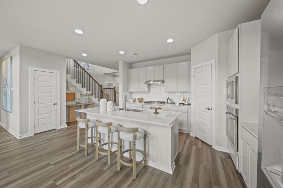 Furnished interior in a model home at Grand Magnolia in Magnolia (Image 6).