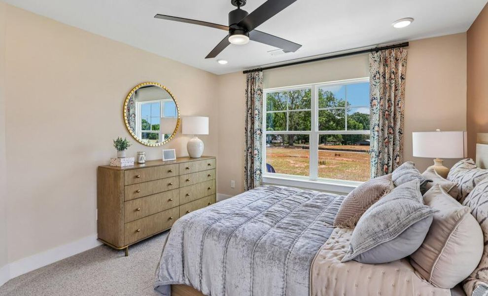 Furnished interior in a model home at Bellevue Townhomes in Greenville (Image 19).