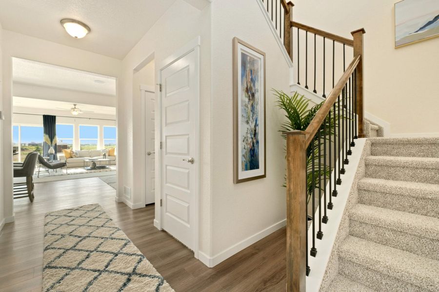 Furnished interior in a model home at Lochbuie Station in Lochbuie (Image 1). Furnished interior in a model home at Lochbuie Station in Lochbuie (Image 1).