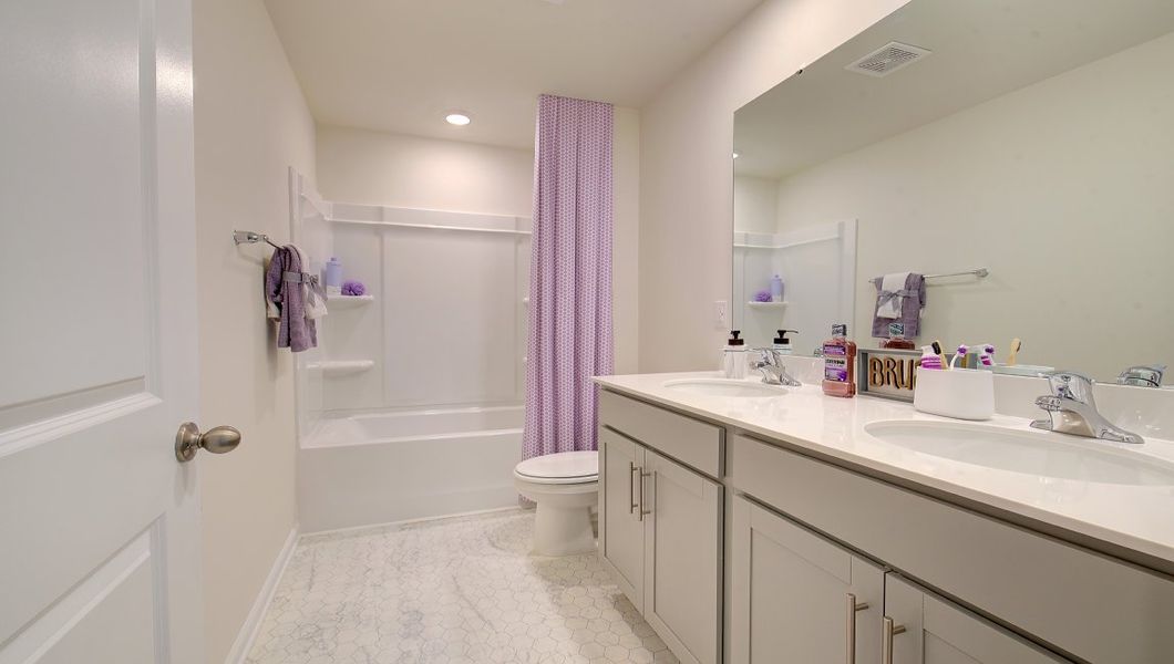 Furnished interior in a model home at Wildbrook Village in Waynesville (Image 9).