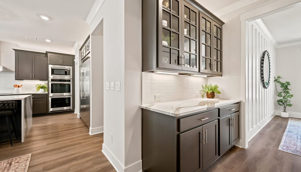 Furnished interior in a model home at Fowler Farms in Auburn (Image 106).