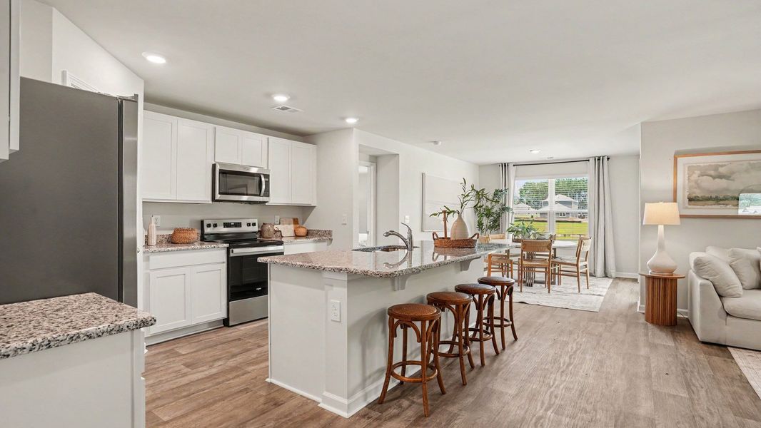 Furnished interior in a model home at Evington Place in Longs (Image 8).