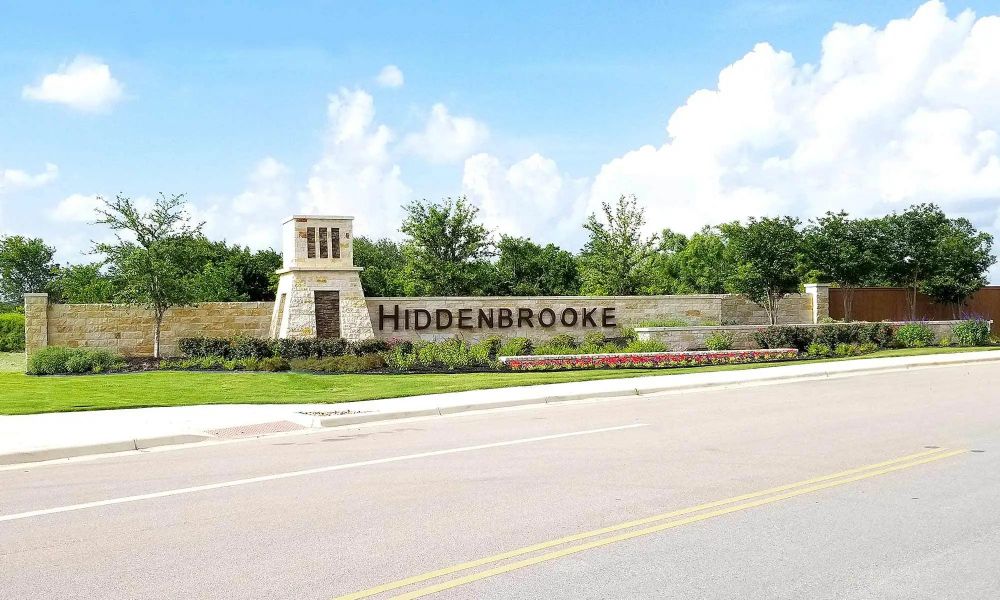 Main entrance to the Hiddenbrooke master-planned community in Seguin, TX, featuring its landmark signage (Image 1). Main entrance to the Hiddenbrooke master-planned community in Seguin, TX, featuring its landmark signage (Image 1).