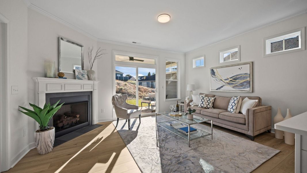 Furnished interior in a model home at Village at Maple Leaf Farm in King (Image 8).