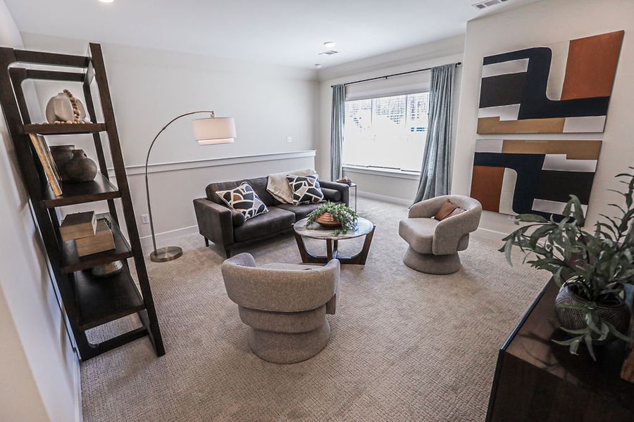 Furnished interior in a model home at Walker Farms in Bartlett (Image 46).