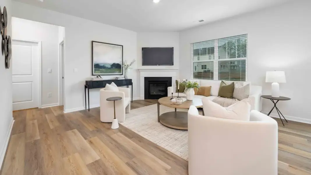 Furnished interior in a model home at Sweetwater Village in Rockwell (Image 12).