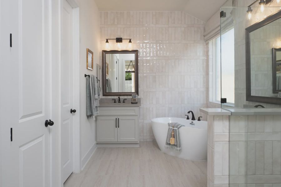 Furnished interior in a model home at Sunday Creek at Kinder Ranch in San Antonio (Image 11).