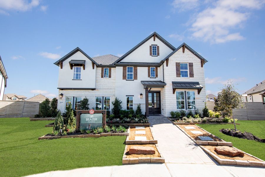 Front exterior of a home in the ARTAVIA community, located in Conroe, TX (Image 6).
