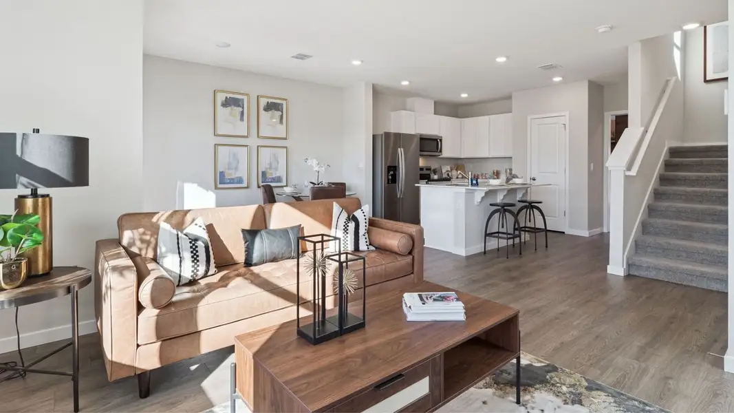Furnished interior in a model home at Fish Lake Cove in Kissimmee (Image 7).