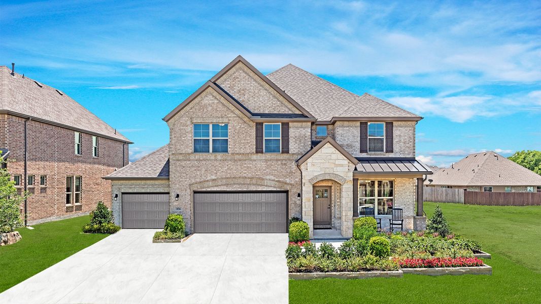 Front exterior of a home in the Woodcreek community, located in Fate, TX (Image 3).