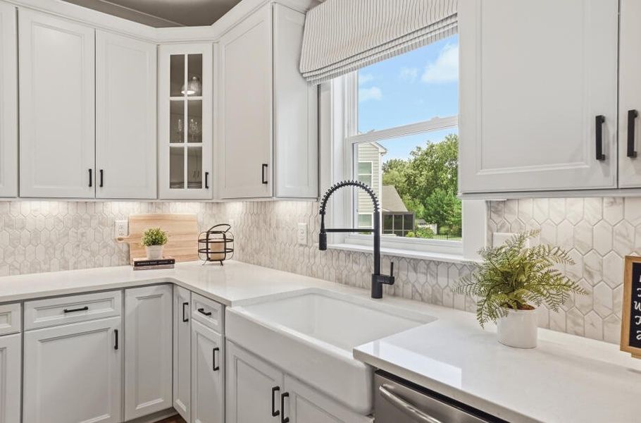 Furnished interior in a model home at Rock Creek in Denver (Image 32).