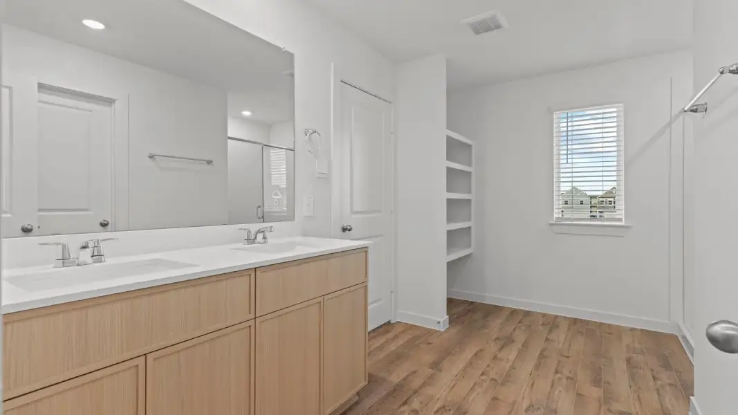 Furnished interior in a model home at Sugar Land Point in Houston (Image 12).