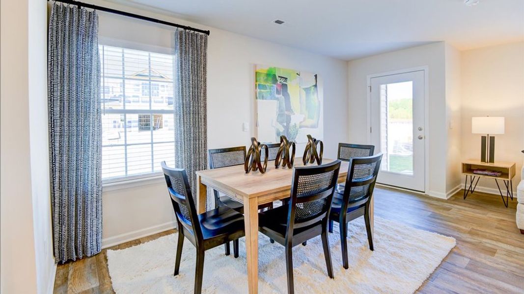 Furnished interior in a model home at Edinborough Townes in Gibsonville (Image 4).