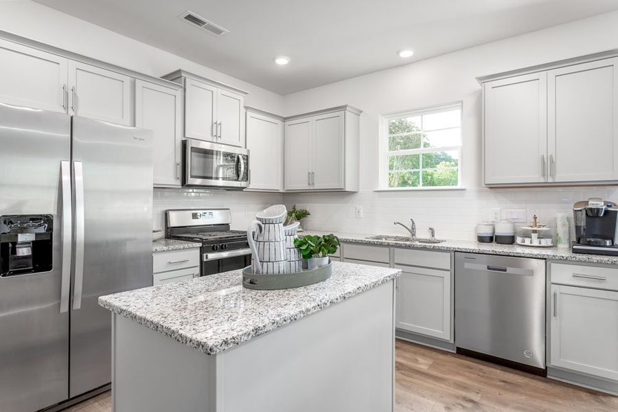 Furnished interior in a model home at Cedar Oaks in Greensboro (Image 11).