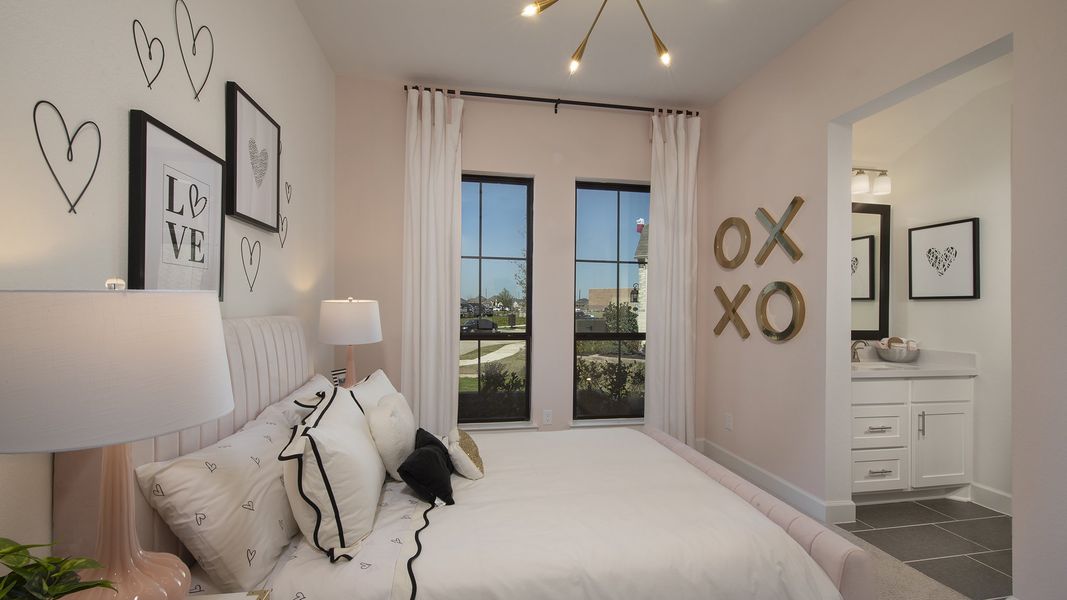 Furnished interior in a model home at Cane Island 80' in Katy (Image 18).