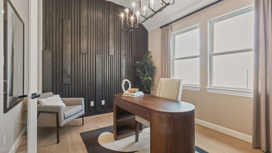 Luxurious River Ranch office with designer lighting, bespoke wooden elements, and elegant furniture.