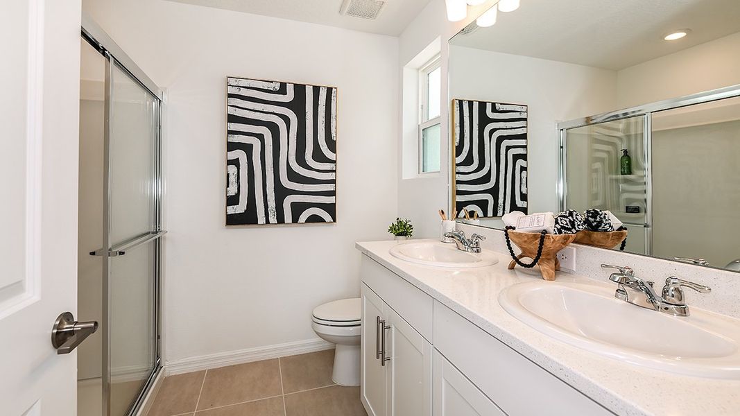 Furnished interior in a model home at The Townhomes at Skye Ranch in Sarasota (Image 15).