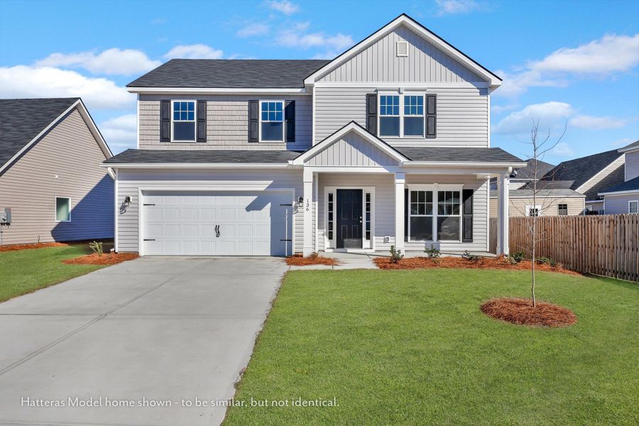 Front exterior of a home in the Covington Pointe community, located in Brunswick, GA (Image 2).
