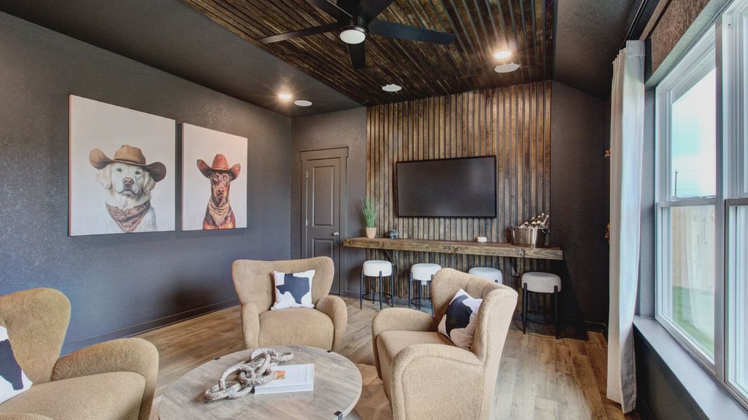 Experience luxury in Prairie Green with unique wall textures, exquisite art, and chic furnishings.