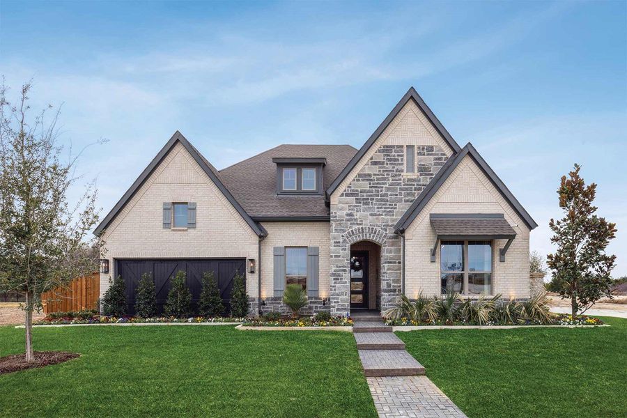Front exterior of a home in the Redden Farms - Executive Series community, located in Midlothian, TX (Image 2).