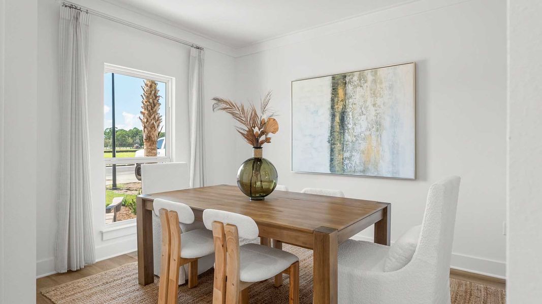 Furnished interior in a model home at Colonial East in Panama City Beach (Image 5).