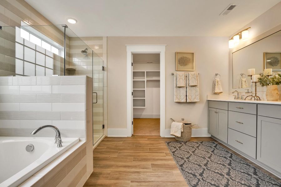Furnished interior in a model home at Carolina Creek in Hampstead (Image 18).