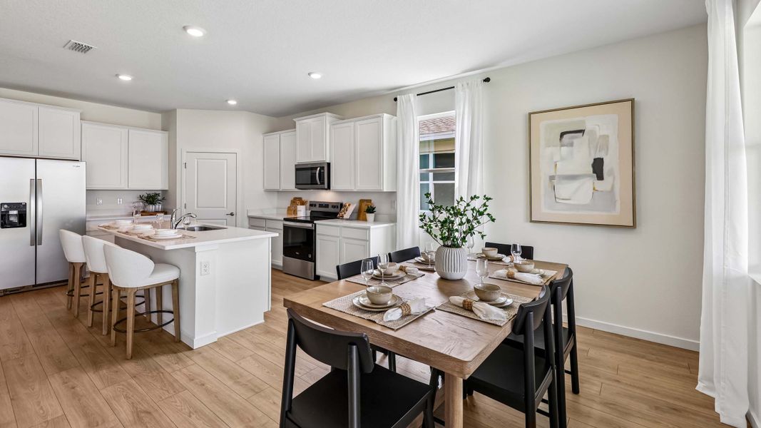 Furnished interior in a model home at Mockingbird Reserve at Winding Oaks in Ocala (Image 13).