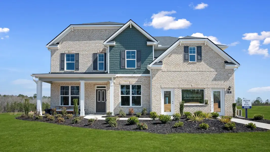 Front exterior of a home in the Evergreen Crossing community, located in Locust Grove, GA (Image 2).