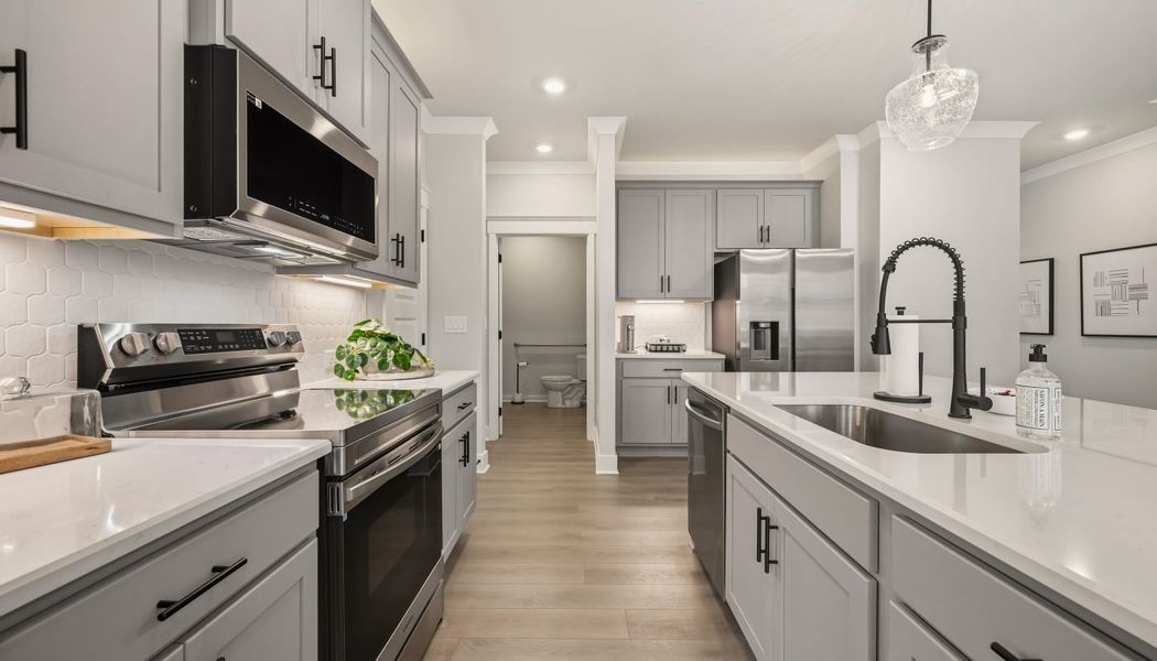 Furnished interior in a model home at Millstone at Mundy Mill in Gainesville (Image 16).