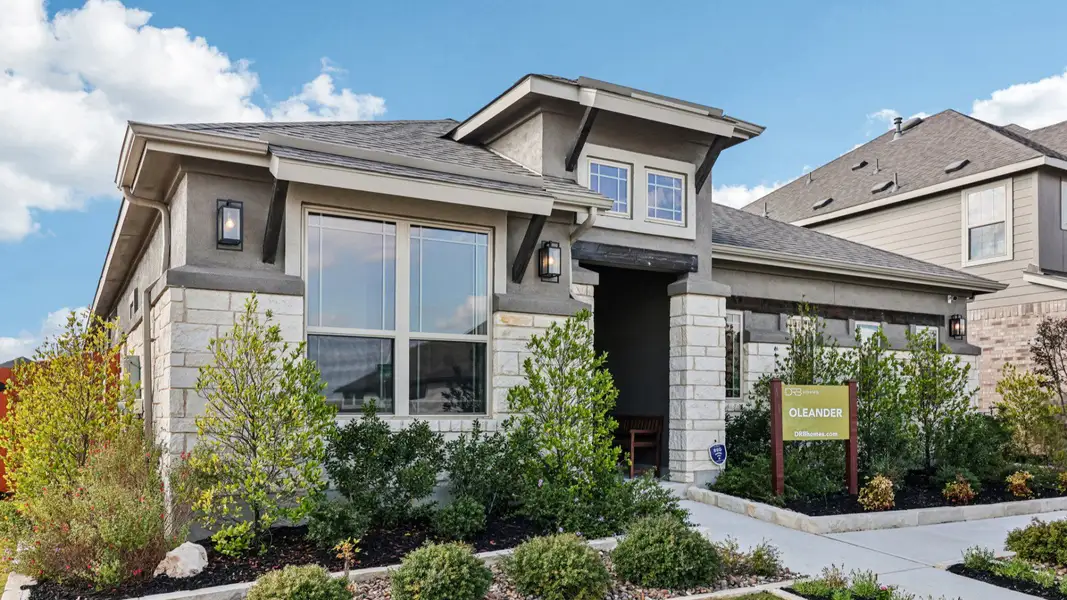 Front exterior of a home in the Meyer Ranch – Premier community, located in New Braunfels, TX (Image 3).