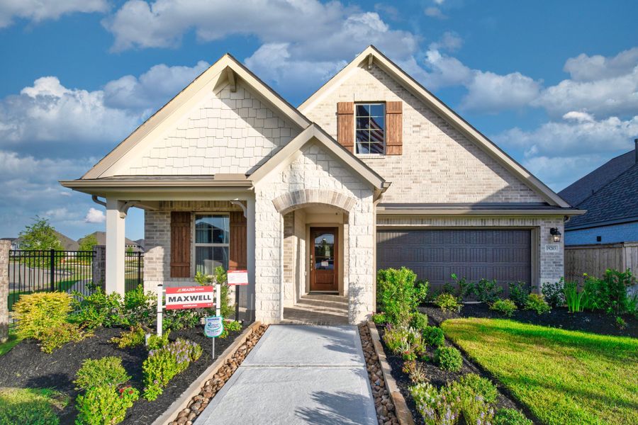 Front exterior of a home in the Amira community, located in Tomball, TX (Image 10).