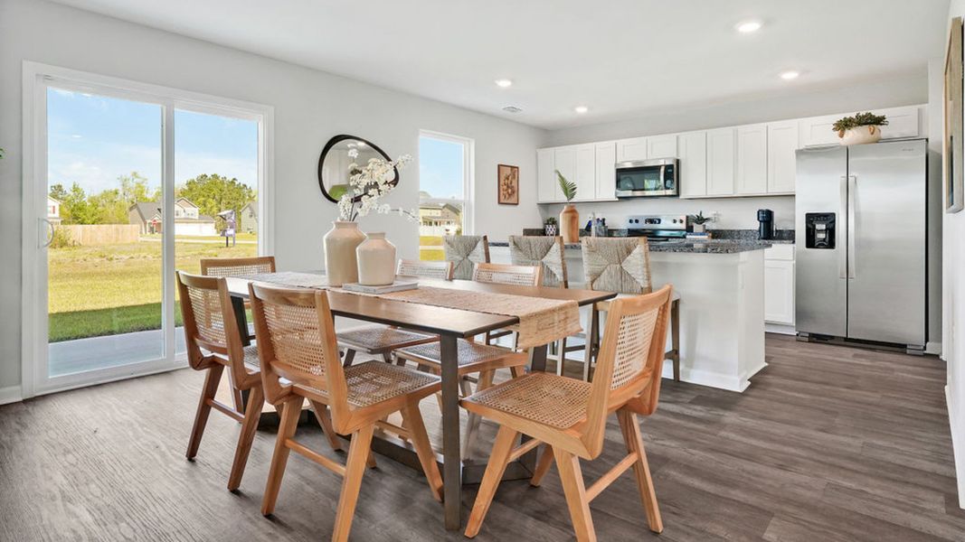 Furnished interior in a model home at Bella Point in Bolivia (Image 12).