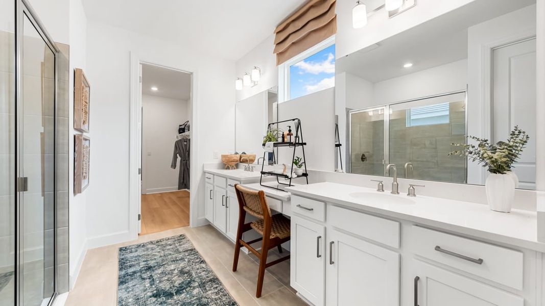 Furnished interior in a model home at Esplanade at Coasterra in Palmetto (Image 39).