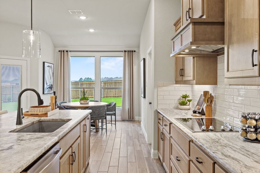 Furnished interior in a model home at Mockingbird Hills - Signature Series in Joshua (Image 16).