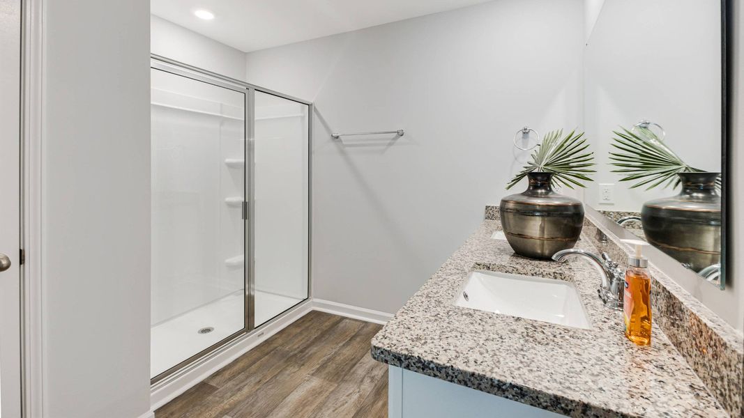 Furnished interior in a model home at Vineyard Trail in Jacksonville (Image 26).