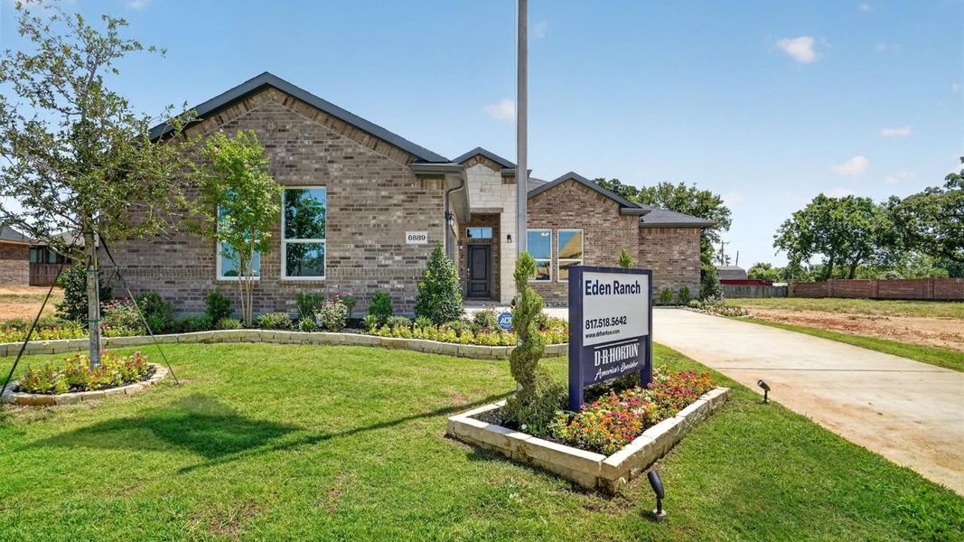 Front exterior of a home in the Eden Ranch community, located in Arlington, TX (Image 10).