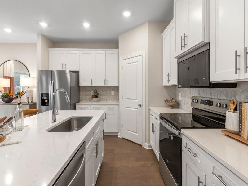 The modern, spacious kitchen is perfect for cooking your favorite meals.