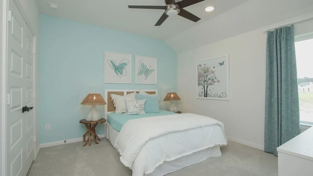 Featuring elegant butterfly art, soft hues, and refined decor, this Ellis Cove bedroom exudes sophistication. Featuring elegant butterfly art, soft hues, and refined decor, this Ellis Cove bedroom exudes sophistication.
