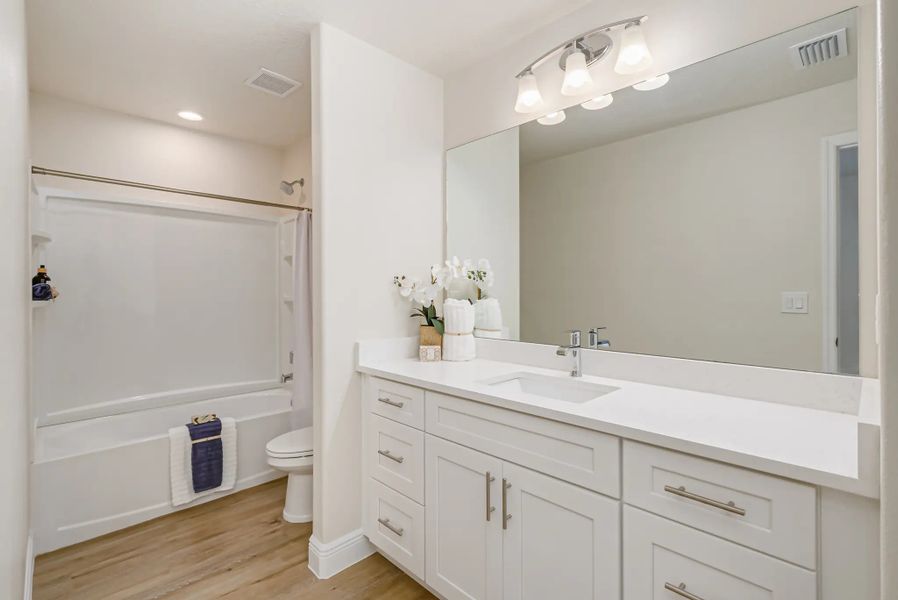 Furnished interior in a model home at Hidden Woods in Melbourne (Image 25).