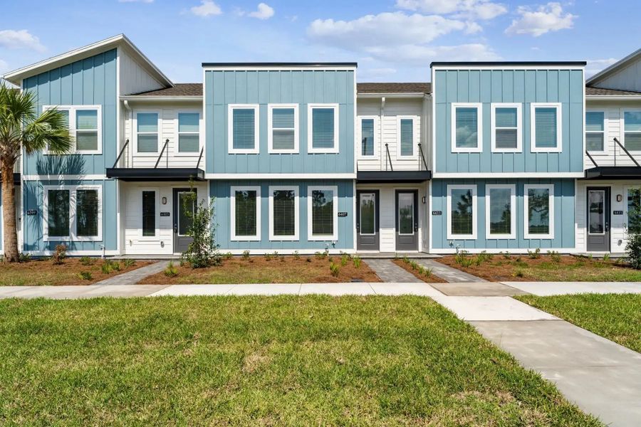 Street view of homes within the Sunbridge master-planned community in St. Cloud, FL (Image 15).
