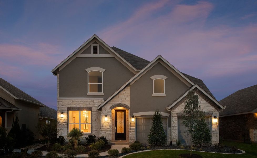 Front exterior of a home in the Provence 50s community, located in Austin, TX (Image 5).