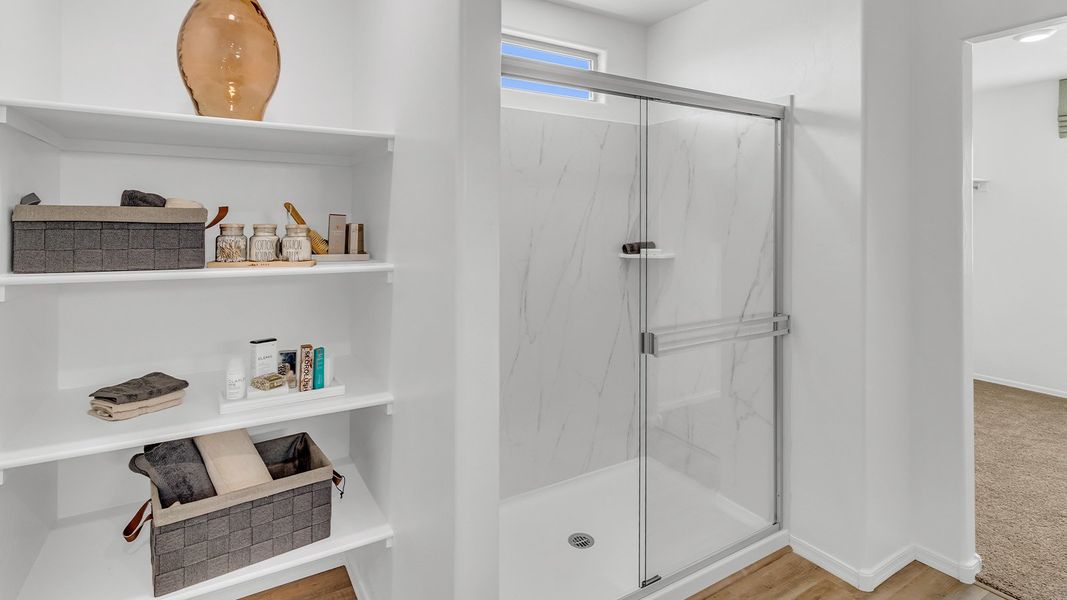 Furnished interior in a model home at Coronet at Gladden Farms in Marana (Image 73).