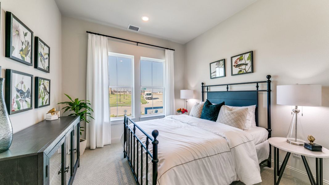 Furnished interior in a model home at Estates at Stacy Crossing in McKinney (Image 38).