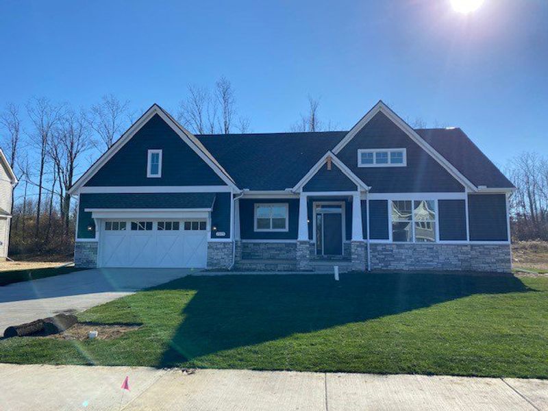 Front exterior of a home in the Preserve at Magnolia Park community, located in Jackson, MI (Image 11). Front exterior of a home in the Preserve at Magnolia Park community, located in Jackson, MI (Image 11).