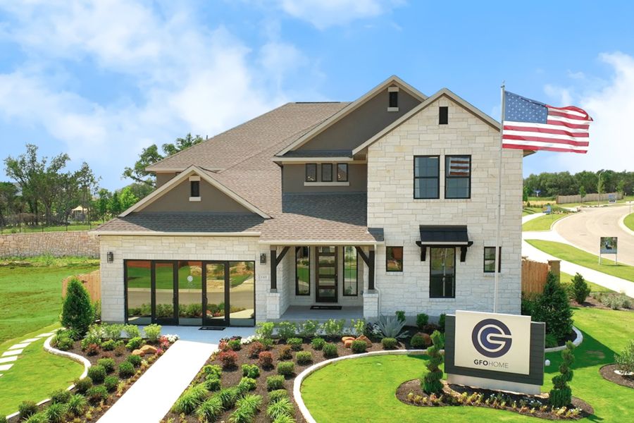 Front exterior of a home in the Heights at San Gabriel community, located in Georgetown, TX (Image 4).